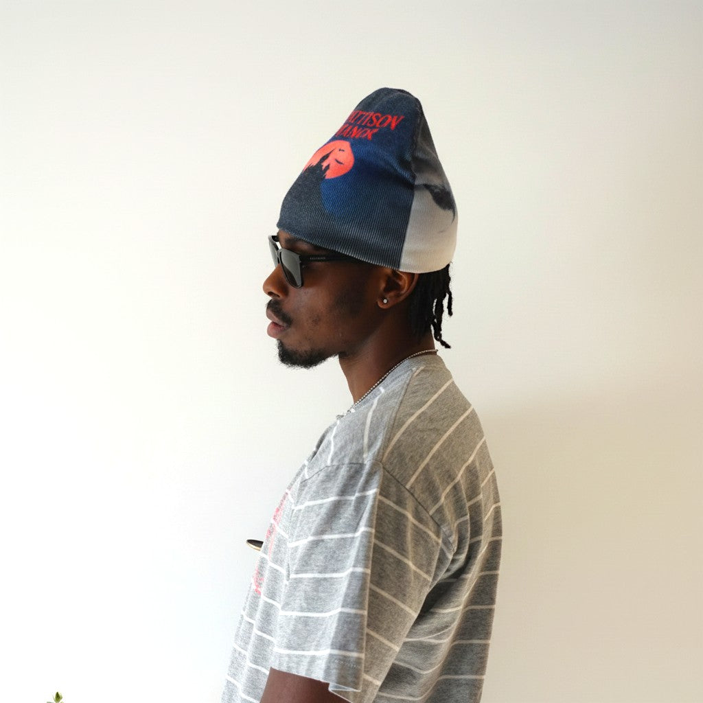 EXHIBIT 002: WOLF PACK